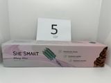 a box of toothbrushes sitting on a shelf