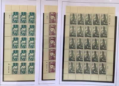 two pages of stamps with a picture of a man and a woman