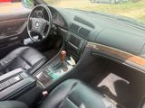 a picture of a car dashboard with a remote control