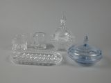 a lot of glass items that are sitting on a table