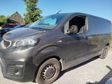 a van that is parked in the parking lot