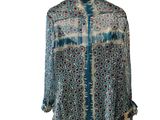 a women ' s blouse with a blue and red floral pattern