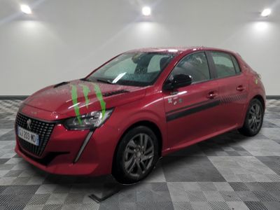 a picture of a red car that is parked on a checkered floor