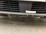 a close up of the front bumper of a car