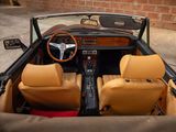 a car that is sitting in a garage with leather seats