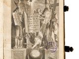 un vieux livre sur lequel figure le dessin d'un homme et d'un chien