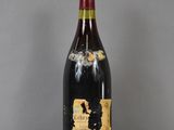 a bottle of wine that is sitting on a table