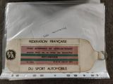 a luggage tag that is attached to a luggage bag