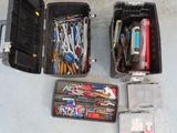 many different tools in a toolbox on the floor