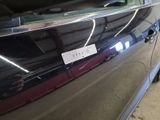 a picture of a car with a sticker on the side of it