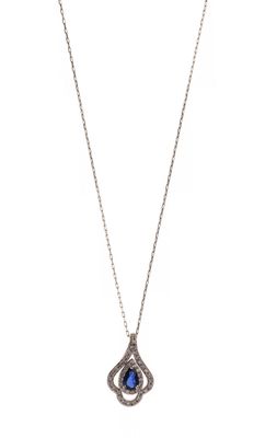 a white gold necklace with a blue sapphire and diamonds