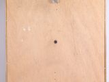 an image of a wooden box with a hole in the middle