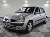 a picture of a silver car parked in a garage