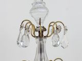 a crystal chandelier that is on a table
