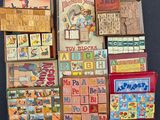 a lot of wooden toys that are sitting on a table