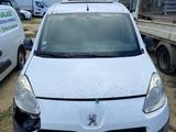 a white van that is parked in a lot