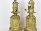 pair of antique brass candlesticks with glass holders