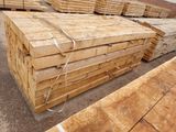 many pieces of wood stacked on top of each other