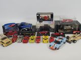 a lot of toy cars that are in a display case