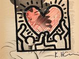 une image représentant un livre sur lequel est dessiné un cœur