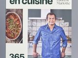 cookbook cover of a cookbook with a picture of a man standing in a kitchen