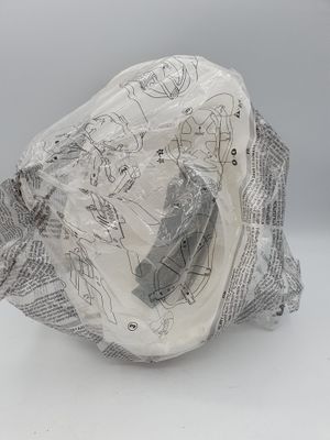 a plastic bag that has a piece of paper inside of it