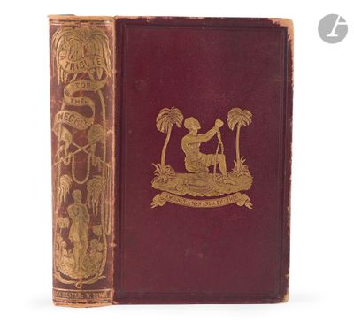 an old book with a gold design on the cover of it