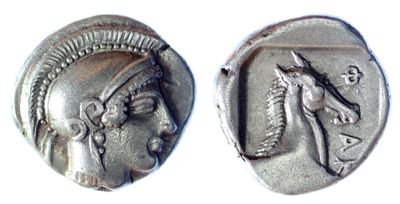 two ancient silver coins with a head of a woman and a horse