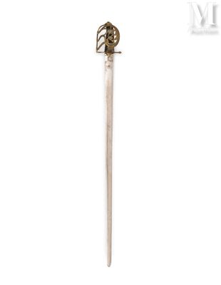 a close up of a sword with a skull on it
