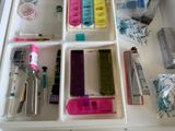 a drawer that has a lot of different items in it