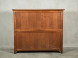 an image of a wooden cabinet with a door on top of it