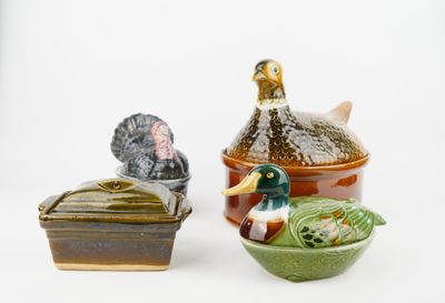 three different types of pottery items sitting on a table