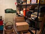 a room with a lot of boxes and boxes on the shelves