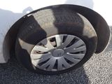 a white car that has a flat tire on it