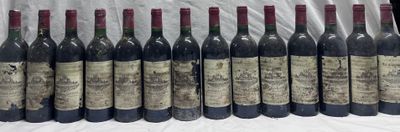 several bottles of wine are lined up in a row on a table