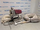 a machine that is sitting on the floor next to some wires