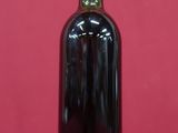 a bottle of wine that is sitting on a table