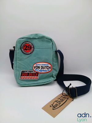 a close up of a small bag with a tag on it