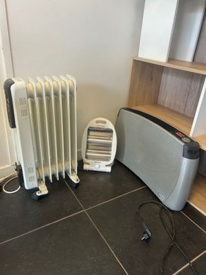 a toaster, toaster, and toaster on the floor