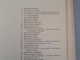 an open book with a list of table des planches on top of it
