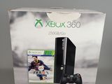 the box is open to show the contents of the xbox 360