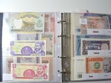 a binder with a lot of different bills in it