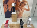 many different watches on display in a display case