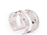 a close up of a silver ring on a white background