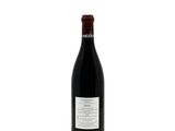 a bottle of red wine on a white background