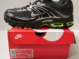 the nike air max is on top of a red box