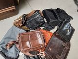 a lot of bags that are sitting on the floor