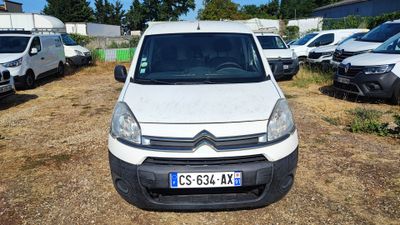 a white van that is parked in a lot
