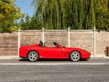 a red sports car parked on the side of the road