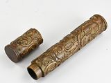 pair of antique brass pipe holders on a white background